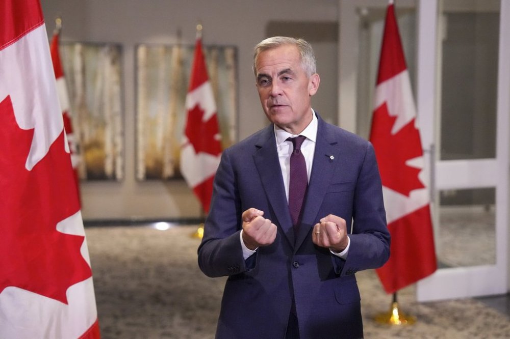 Prime Minister Mark Carney speaks to the media at the Liberal cabinet retreat in Toronto on Wednesday, Sept. 3, 2025. THE CANADIAN PRESS/Chris Young