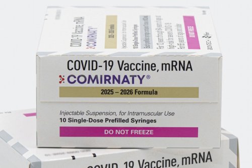 This photo provided by Pfizer in August 2025 shows boxes for the updated COVID-19 vaccine Comirnaty. (Pfizer via AP)