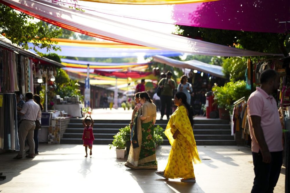 Shoppers visit a craft market in New Delhi, India on Monday, Sept. 11, 2023. THE CANADIAN PRESS/Sean Kilpatrick