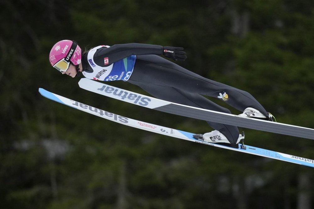 Abigail Strate of Canada competes at the Women Normal Hill HS102 Individual Ski Jumping event at the Nordic World Ski Championships, in Trondheim, Norway, Friday, Feb. 28, 2025. (AP Photo/Matthias Schrader)