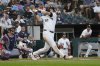 Chicago White Sox's Colson Montgomery hits a grand slam against the Minnesota Twins during the second inning of a baseball game Saturday, August 23, 2025, in Chicago. (AP Photo/David Banks)