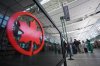 Passengers use a kiosk to check in for an Air Canada flight at Vancouver International Airport, in Richmond, B.C., on Wednesday, Aug. 13, 2025. Air Canada is preparing to gradually suspend flights ahead of a potential work stoppage on Saturday. The airline said the first flights will be cancelled Thursday, with more on Friday and a complete cessation of flying by Air Canada and Air Canada Rouge by the weekend if it doesn't reach a last-minute deal with the flight attendants' union. THE CANADIAN PRESS/Darryl Dyck