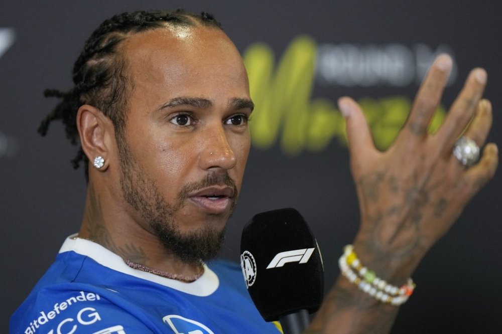 Ferrari driver Lewis Hamilton of Britain gestures during a news conference at the Monza racetrack, in Monza, Italy, Thursday, Sept. 4, 2025. (AP Photo/Luca Bruno)