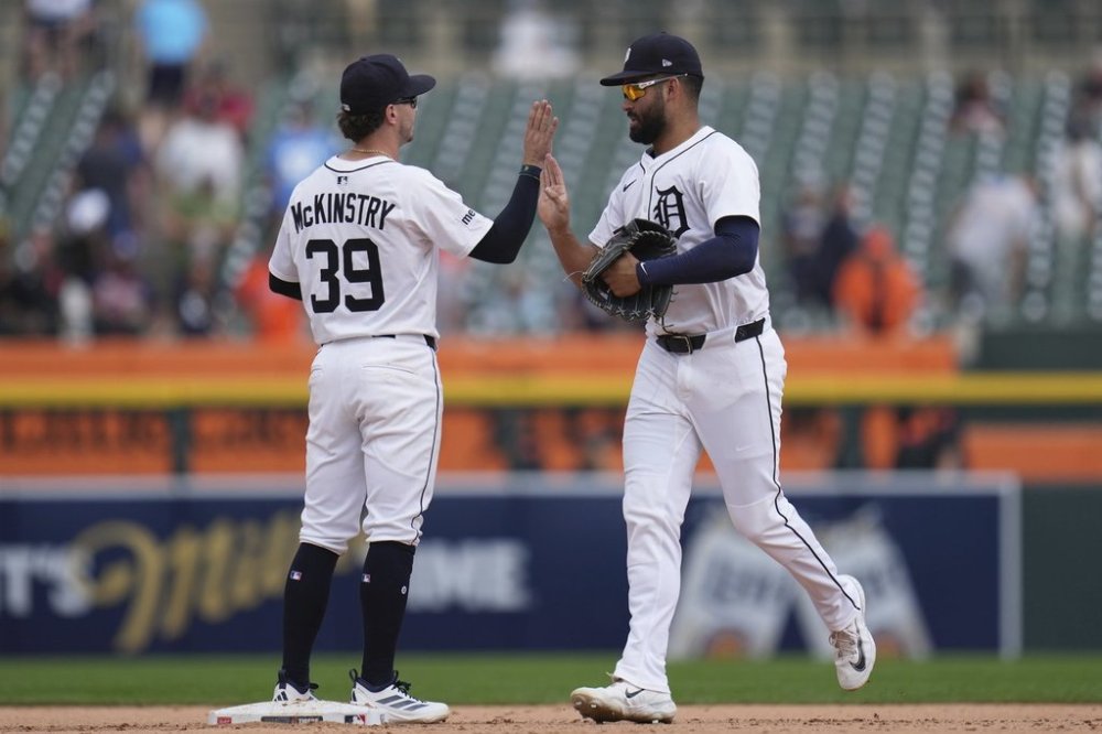 Detroit Tigers shortstop Zach McKinstry, left, and left fielder Riley Greene celebrate after the team's win over the New York Mets in a baseball game, Wednesday, Sept. 3, 2025, in Detroit. (AP Photo/Ryan Sun)