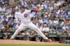 Chicago Cubs starting pitcher Javier Assad throws against the Pittsburgh Pirates during the first inning of a baseball game, Sunday, Aug. 17, 2025, at Wrigley Field in Chicago. (AP Photo/Mark Black)