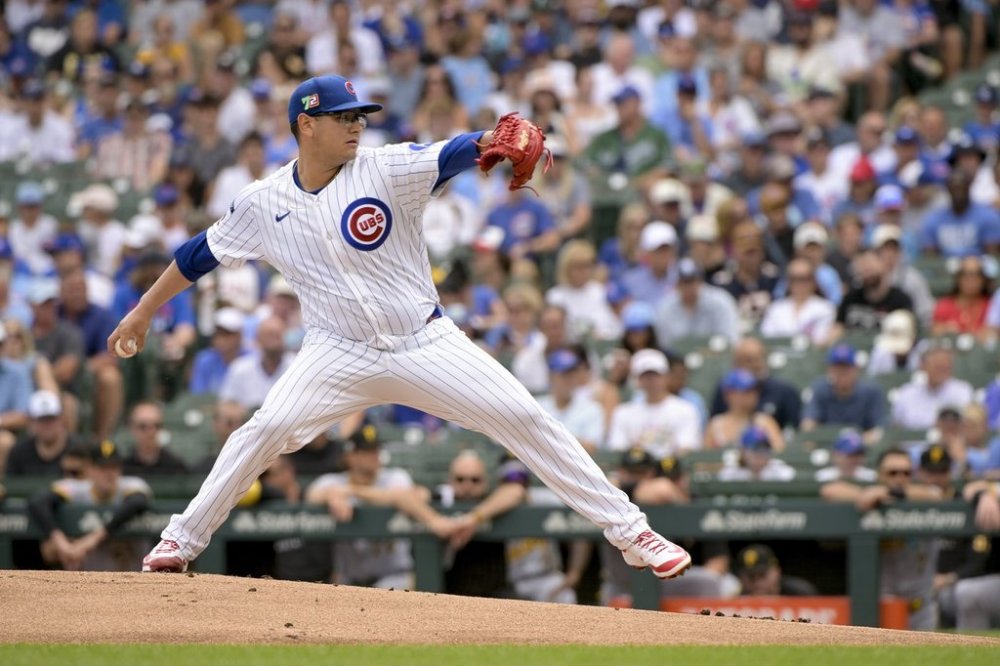 Chicago Cubs starting pitcher Javier Assad throws against the Pittsburgh Pirates during the first inning of a baseball game, Sunday, Aug. 17, 2025, at Wrigley Field in Chicago. (AP Photo/Mark Black)