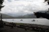 Rain and smoke from the Mount Underwood wildfire can be seen from across the Alberni Inlet at the Macktush Creek Campsite, south of Port Alberni, B.C., on Saturday, Aug. 16, 2025. THE CANADIAN PRESS/Chad Hipolito