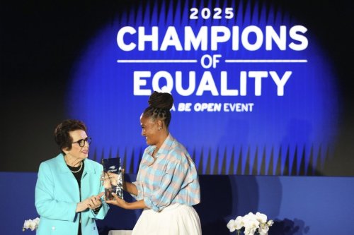 Billie Jean King, left, presents the Champions of Equality award to Ava Duvernay, before the women's singles semifinals of the U.S. Open tennis championships, Thursday, Sept. 4, 2025, in New York. (AP Photo/Kirsty Wigglesworth)