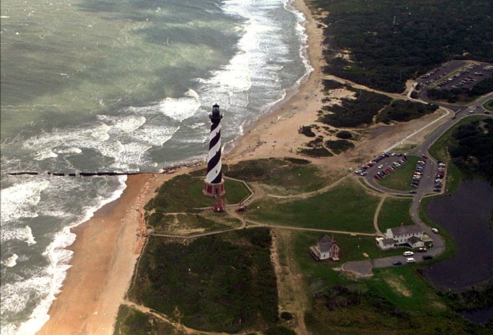 FILE - The Cape Hatteras lighthouse stands, Aug. 29, 1995 on the Outer Banks of North Carolina. (AP Photo/Ruth Fremson, File)