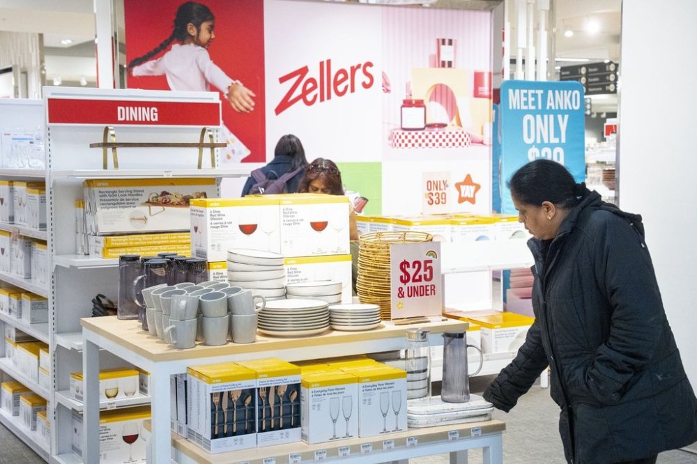 Shoppers browse products at a Zellers pop-up store in Scarborough Town Centre Mall, in Scarborough, Ont., on Thursday, March 23, 2023. The defunct retail brand is returning with an Edmonton store. THE CANADIAN PRESS/Chris Young