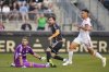 Philadelphia Union's Indiana Vassilev, centre, watches his goal past Toronto FC goalkeeper Luka Gavran, left, and Raoul Petretta, right, during the first half of an MLS soccer match, Saturday, Aug. 9, 2025, in Chester, Pa. (AP Photo/Derik Hamilton)