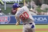Chicago Cubs' Kyle Tucker hits a two-run home run during the third inning of a baseball game against the Los Angeles Angels, Saturday, Aug. 23, 2025, in Anaheim, Calif. (AP Photo/Mark J. Terrill)
