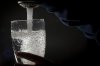Drinking water is poured into a glass from a faucet in North Vancouver, Tuesday, July, 30, 2019. THE CANADIAN PRESS/Jonathan Hayward
