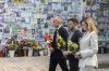 In this photo provided by the Ukrainian Presidential Press Office, Prime Minister Mark Carney, left, Ukrainian President Volodymyr Zelenskyy, center, and his wife Olena attend a flower laying ceremony at the Memory Wall of Fallen Defenders of Ukraine in Kyiv, Ukraine, on Sunday, Aug. 24, 2025. (Ukrainian Presidential Press Office via AP)