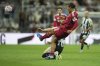 Newcastle's Anthony Gordon tackles Liverpool's Virgil van Dijk during the Premier League soccer match between Newcastle and Liverpool in Newcastle, England, Monday, Aug. 25, 2025. (AP Photo/Jon Super)