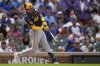 Milwaukee Brewers' Joey Ortiz hits a one-run single during the eighth inning of a baseball game against the Chicago Cubs, Monday, Aug. 18, 2025, in Chicago. (AP Photo/Erin Hooley)