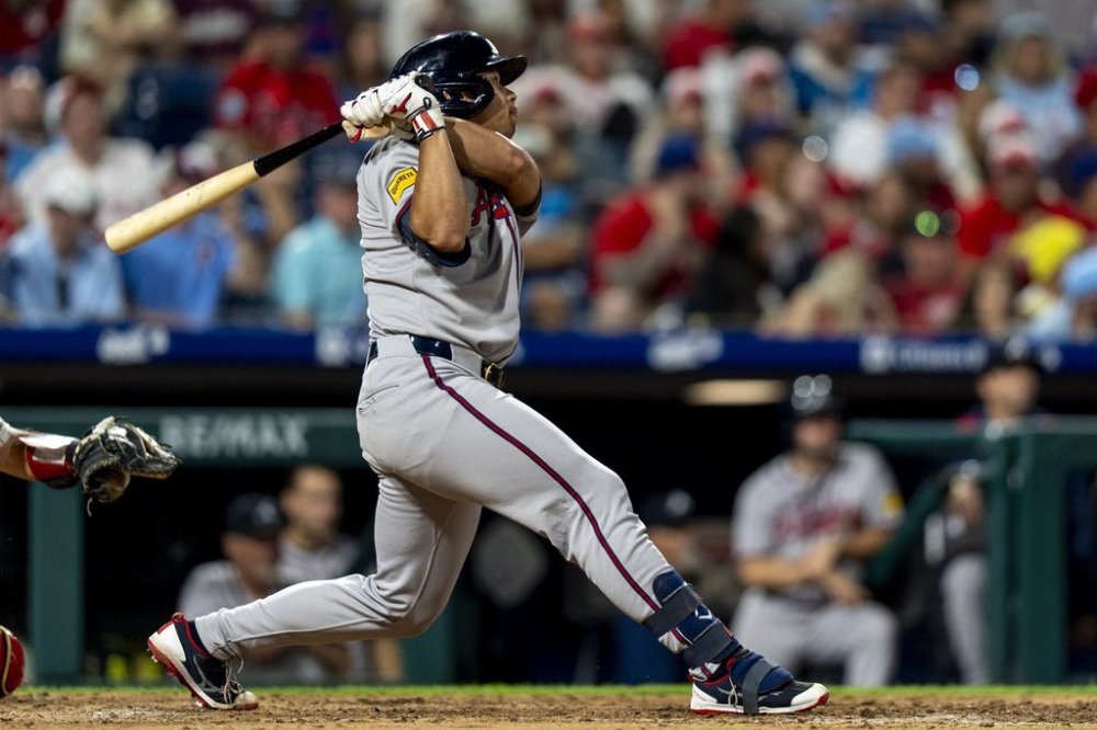 Atlanta Braves' Drake Baldwin hits a two-run home run during the ninth inning of a baseball game against the Philadelphia Phillies, Sunday, Aug. 31, 2025, in Philadelphia. (AP Photo/Chris Szagola)