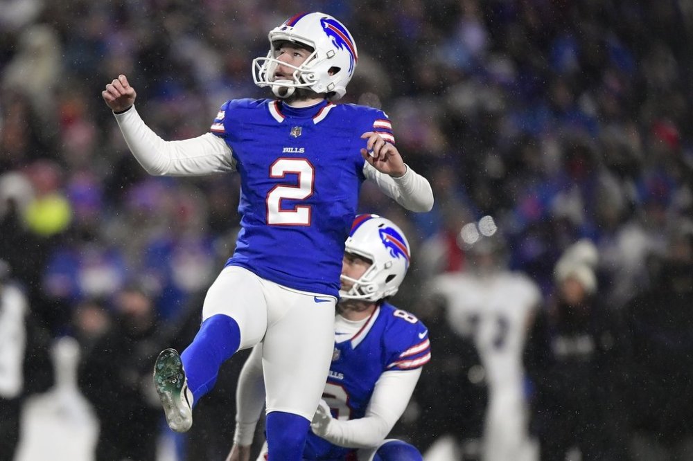 FILE - Buffalo Bills placekicker Tyler Bass (2) boots a field goal against the Baltimore Ravens during the fourth quarter of an NFL football divisional playoff game Jan. 19, 2025, in Orchard Park, N.Y. (AP Photo/Adrian Kraus, File)