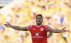 Mainz' Nadiem Amiri celebrates after scoring the opening goal during the German soccer cup first round match between Dynamo Dresden and FSV Mainz 05 in Dresden, Germany, Monday, Aug. 18, 2025. (Robert Michael/dpa via AP)