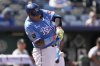 Kansas City Royals' Salvador Perez hits an RBI single during the eighth inning of a baseball game against the Chicago White Sox, Sunday, Aug. 17, 2025, in Kansas City, Mo. (AP Photo/Charlie Riedel)