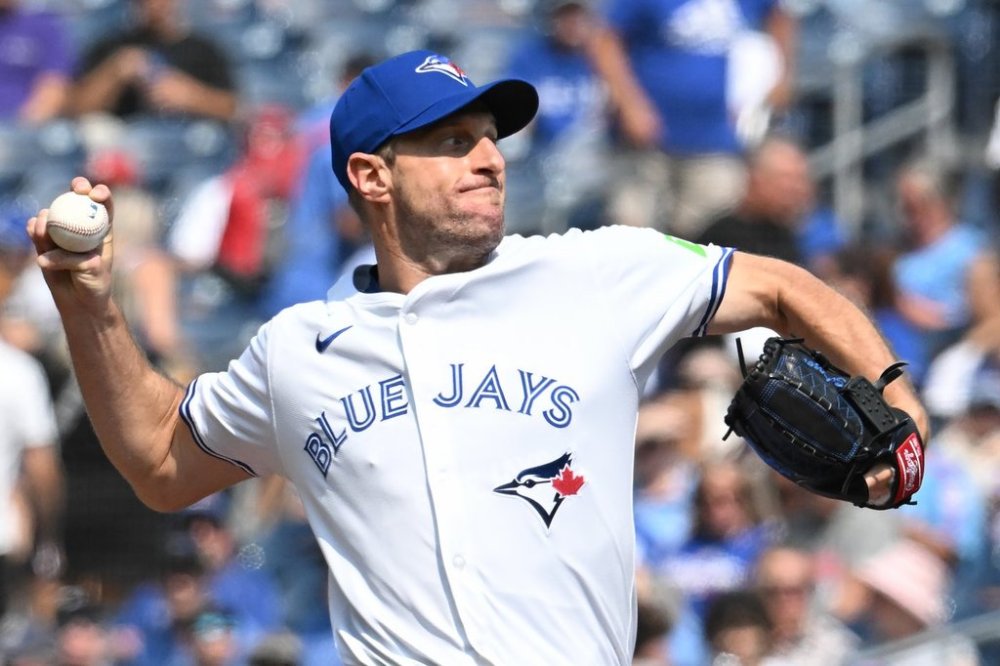 Blue Jays starting pitcher Max Scherzer (31) throws to a Chicago Cubs batter in the first inning of a Major League Baseball game in Toronto on Thursday, Aug. 14, 2025. THE CANADIAN PRESS/Jon Blacker