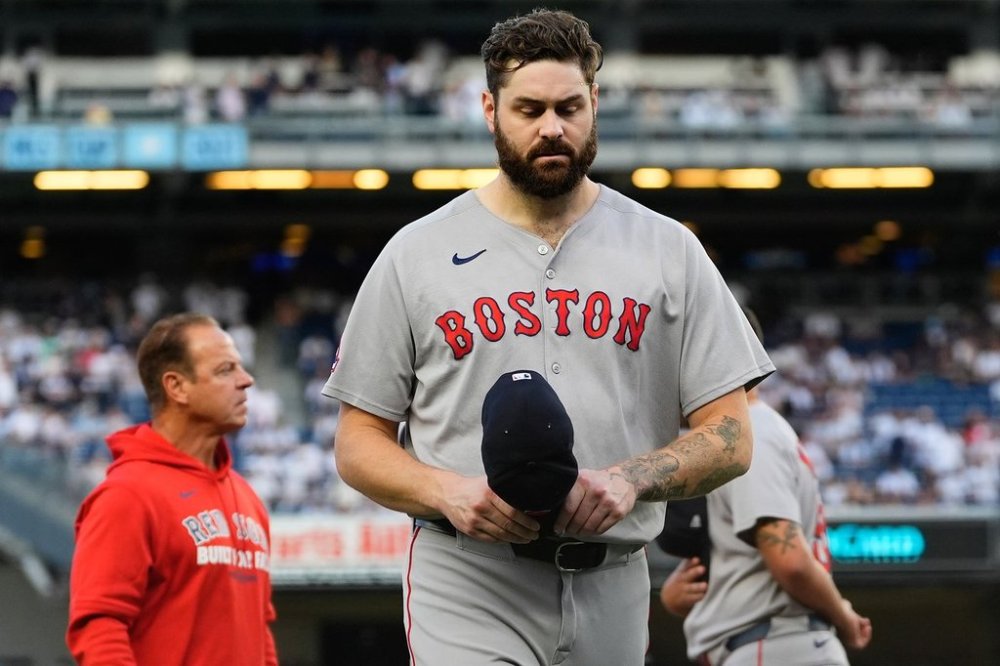 Boston Red Sox pitcher Lucas Giolito walks off the field after player introductions before Game 1 of an American League wild-card baseball playoff series against the New York Yankees, Tuesday, Sept. 30, 2025, in New York. (AP Photo/Yuki Iwamura)