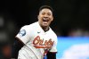 Baltimore Orioles' Samuel Basallo celebrates after hitting a walk-off single during the 11th inning of a baseball game against the Pittsburgh Pirates, Tuesday, Sept. 9, 2025, in Baltimore. (AP Photo/Stephanie Scarbrough)