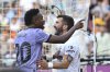 FILE - Real Madrid's Vinicius Junior, left, confronts Valencia fans as Valencia's Jose Luis Gaya reacts during a Spanish La Liga soccer match between Valencia and Real Madrid, at the Mestalla stadium in Valencia, Spain, Sunday, May 21, 2023. (AP Photo/Alberto Saiz, File)