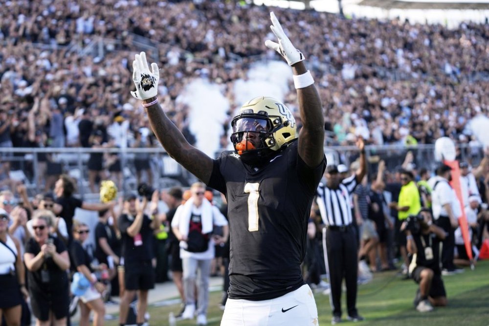 Central Florida tight end Kylan Fox (1) celebrates after scoring a touchdown against North Carolina during the first half of an NCAA college football game, Saturday, Sept. 20, 2025, in Orlando, Fla. (AP Photo/John Raoux)