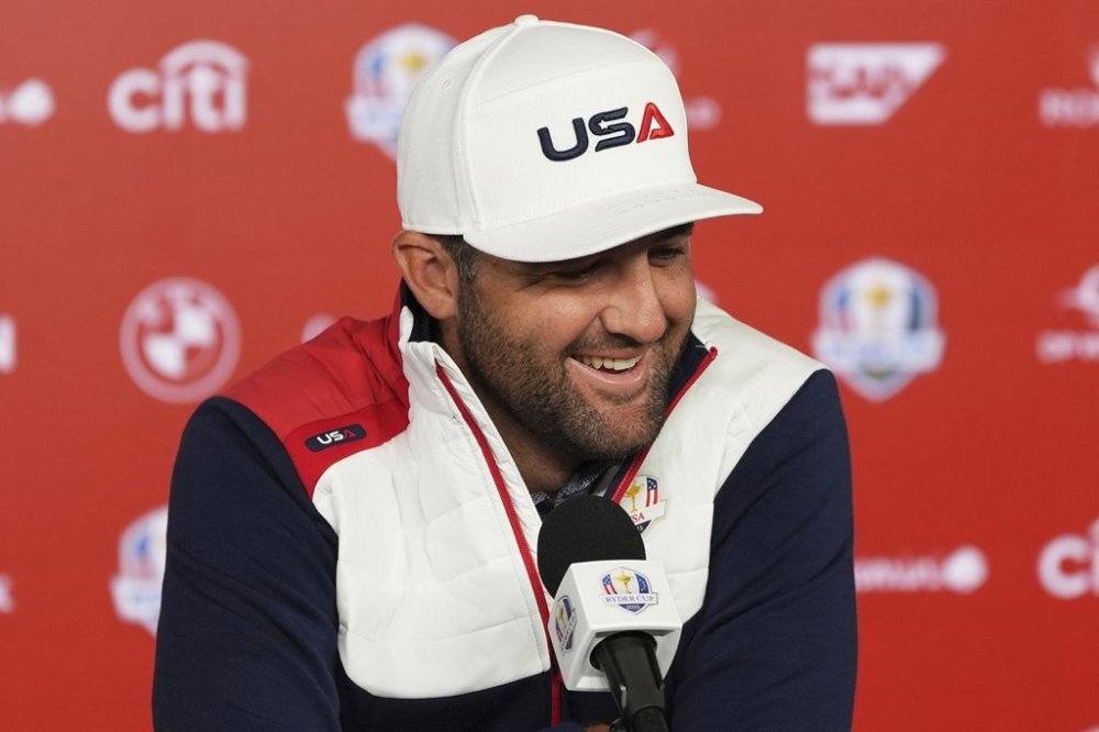 United States' Scottie Scheffler speaks during a news conference before a practice round at the Ryder Cup golf tournament, Tuesday, Sept. 23, 2025, in Farmingdale, N.Y., at Bethpage State Park's Black Course between the United States and Europe. (AP Photo/Linsey Wasson)