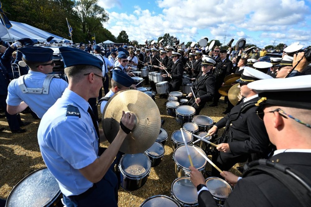 FILE - Members of Navy and Air Force marching bands perform before an NCAA college football game, Saturday, Oct. 21, 2023, in Annapolis. (AP Photo/Terrance Williams, file)