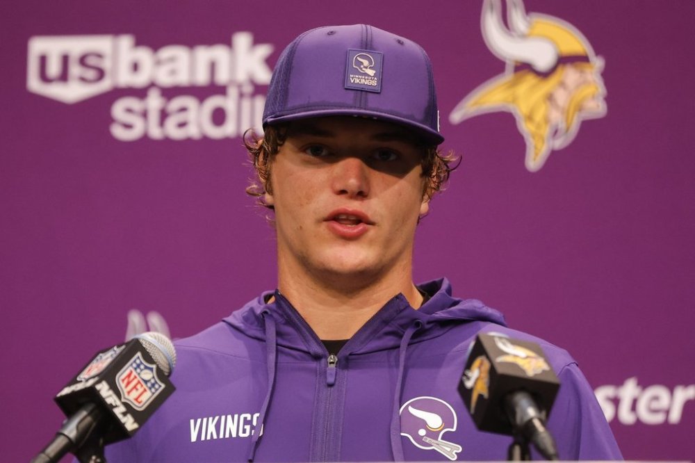 Minnesota Vikings' J.J. McCarthy speaks after an NFL football game against the Atlanta Falcons,, Sunday, Sept. 14, 2025, in Minneapolis. (AP Photo/Bruce Kluckhohn)