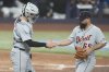 Detroit Tigers pitcher José Urquidy (65) and catcher Dillon Dingler (13) shake hands during the sixth inning of a baseball game against the Miami Marlins Sunday, Sept. 14, 2025, in Miami. (AP Photo/Marta Lavandier)