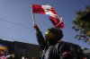 Canada Post workers are joined by CUPE union members as they hold a rally outside MP Julie Dabrusin's office in Toronto on Wednesday, Oct. 1, 2025. THE CANADIAN PRESS/Chris Young