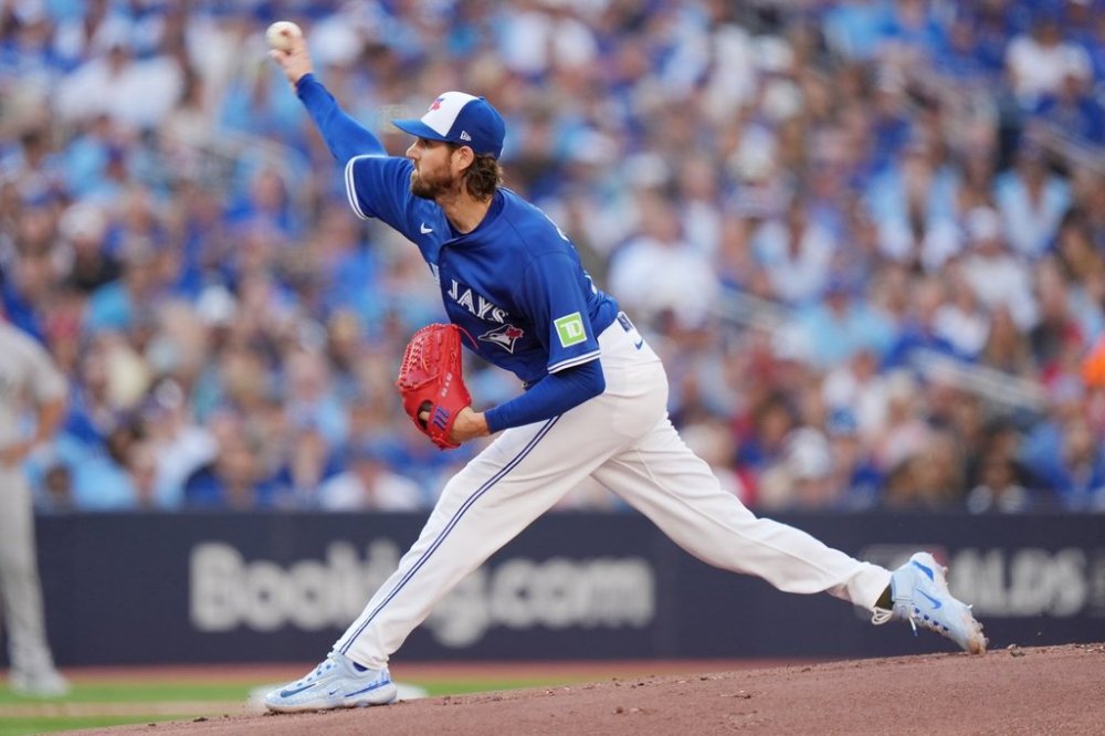 Toronto Blue Jays pitcher Kevin Gausman (34) delivers to the New York Yankees during the first inning of game 1 in MLB American League Division Series baseball action in Toronto on Saturday, October 4, 2025. THE CANADIAN PRESS/Frank Gunn