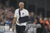 PSG's head coach Luis Enrique follows the game during the French League One soccer match between Marseille and Paris Saint-Germain at Orange Velodrome in Marseille, France, Monday, Sept. 22, 2025. (AP Photo/Philippe Magoni)