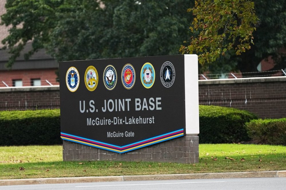 A sign for U.S. Joint Base McGuire-Dix-Lakehurst in New Jersey is seen Tuesday, Sept. 30, 2025. (AP Photo/Matt Rourke)