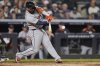 Detroit Tigers' Gleyber Torres hits a two-run single during the fifth inning of a baseball game against the New York Yankees Wednesday, Sept. 10, 2025, in New York. (AP Photo/Frank Franklin II)