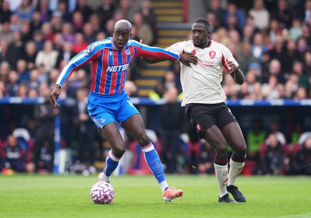 Crystal Palace's Jean-Philippe Mateta, left and Liverpool's Ibrahima Konate vie for the ball, during the English Premier League soccer match between Crystal Palace and Liverpool, at Selhurst Park, in south London, Saturday, Sept. 27, 2025. (Jonathan Brady/PA via AP)