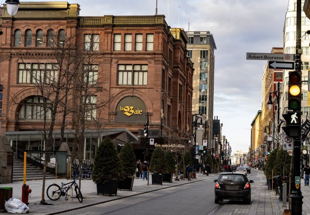 People walk past the Hudson's Bay department store in downtown Montreal on Monday, March 17, 2025. THE CANADIAN PRESS/Christinne Muschi. The Canadian Press