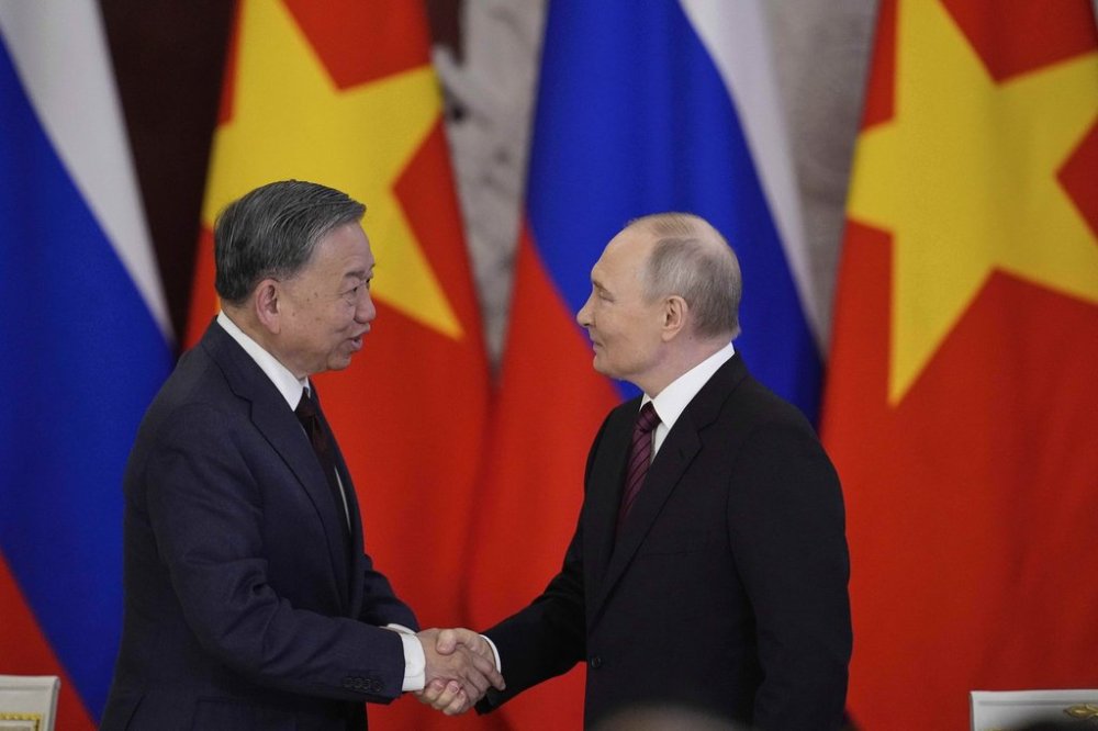 FILE - Russian President Vladimir Putin, right, and General Secretary of the Central Committee of the Communist Party of Vietnam To Lam shake hands after a signing ceremony following their meeting at the Kremlin in Moscow, Russia, on May 10, 2025, during celebrations of the 80th anniversary of the Soviet Union's victory over Nazi Germany during the World War II. (AP Photo/Pavel Bednyakov, File)