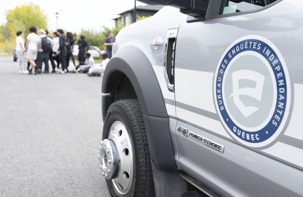 A Bureau des enquetes independantes (BEI) truck is parked in a neighbourhood during an investigation of a police shooting in Longueuil, Que., on Monday, Sept. 22, 2025.