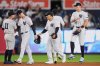 New York Yankees' Anthony Volpe, left, and Aaron Judge celebrates with teammates after a baseball game against the Chicago White Sox Thursday, Sept. 25, 2025, in New York. (AP Photo/Frank Franklin II)