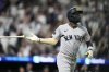 New York Yankees' Jazz Chisholm Jr. flips his bat after hitting a two-run home run during the seventh inning of a baseball game against the Baltimore Orioles, Friday, Sept. 19, 2025, in Baltimore. (AP Photo/Stephanie Scarbrough)