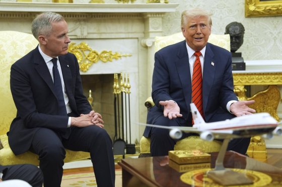 Prime Minister Mark Carney, left, with U.S. President Donald Trump at the White House in May. (Evan Vucci / The Associated Press files)