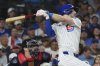 Chicago Cubs' Kyle Tucker hits a three-run home run during the third inning of a baseball game against the Atlanta Braves in Chicago, Tuesday, Sept. 2, 2025. (AP Photo/Nam Y. Huh)