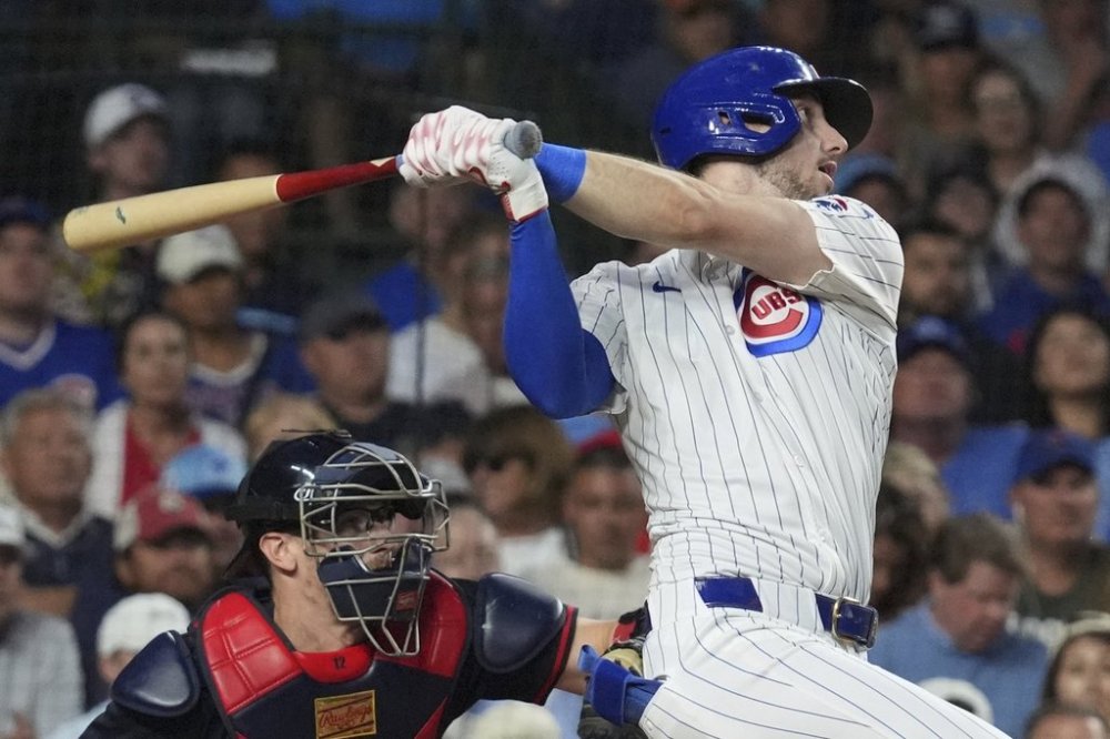 Chicago Cubs' Kyle Tucker hits a three-run home run during the third inning of a baseball game against the Atlanta Braves in Chicago, Tuesday, Sept. 2, 2025. (AP Photo/Nam Y. Huh)