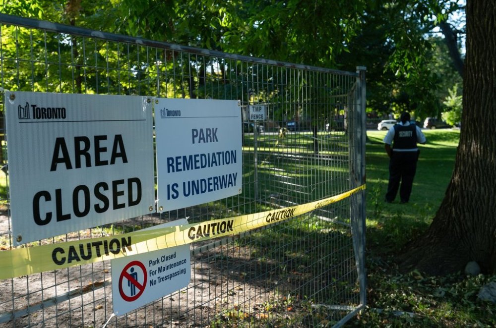 Security guards watch over Dufferin Grove Park in Toronto, on Wednesday, October 1, 2025. THE CANADIAN PRESS/Laura Proctor