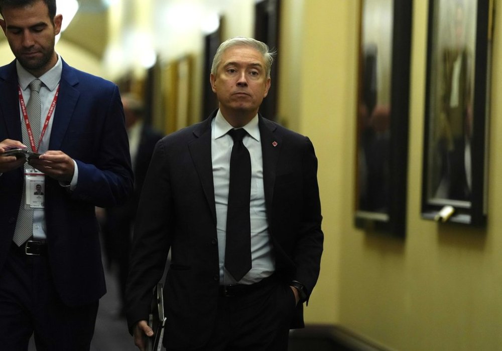Minister of Finance and National Revenue Francois-Philippe Champagne makes his way to a meeting of the Liberal caucus on Wednesday, Oct. 1, 2025. THE CANADIAN PRESS/Justin Tang