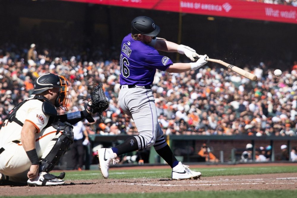 Colorado Rockies' Blaine Crim cracks his bat on a line out during the eighth inning of an MLB baseball game against the San Francisco Giants, Saturday, Sept. 27, 2025, in San Francisco. (AP Photo/Benjamin Fanjoy)